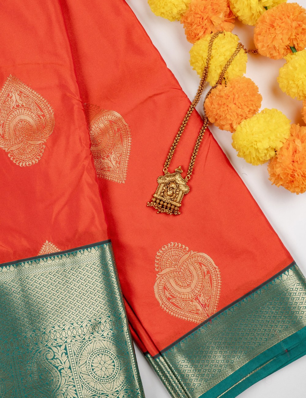 Coral Orange & Teal Banarasi Silk Saree with Zari Motifs