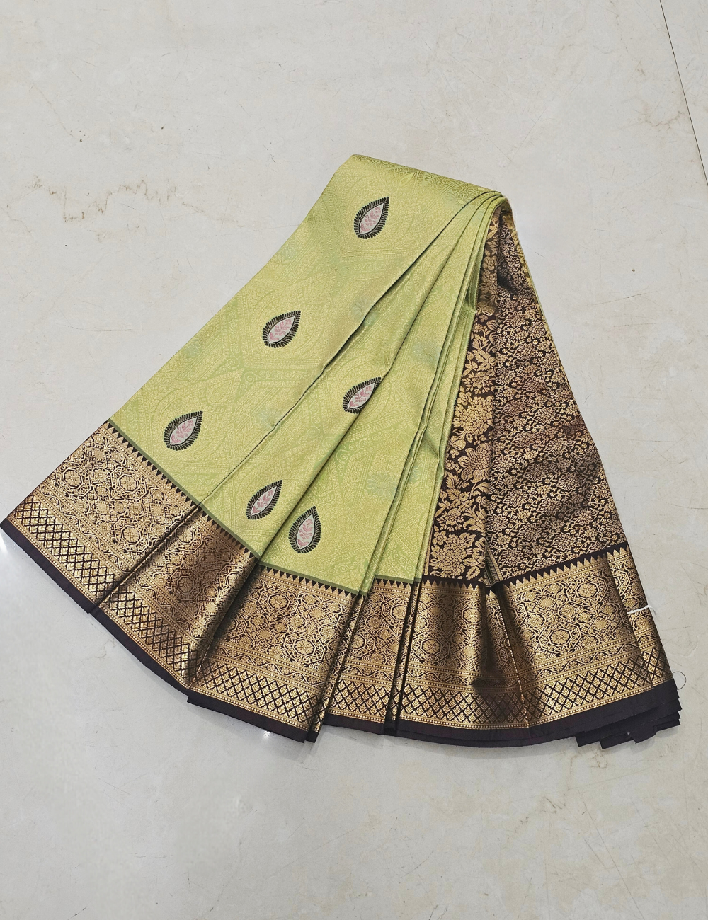 Pista Green Printed Saree with Rich Brown & Antique Gold Border